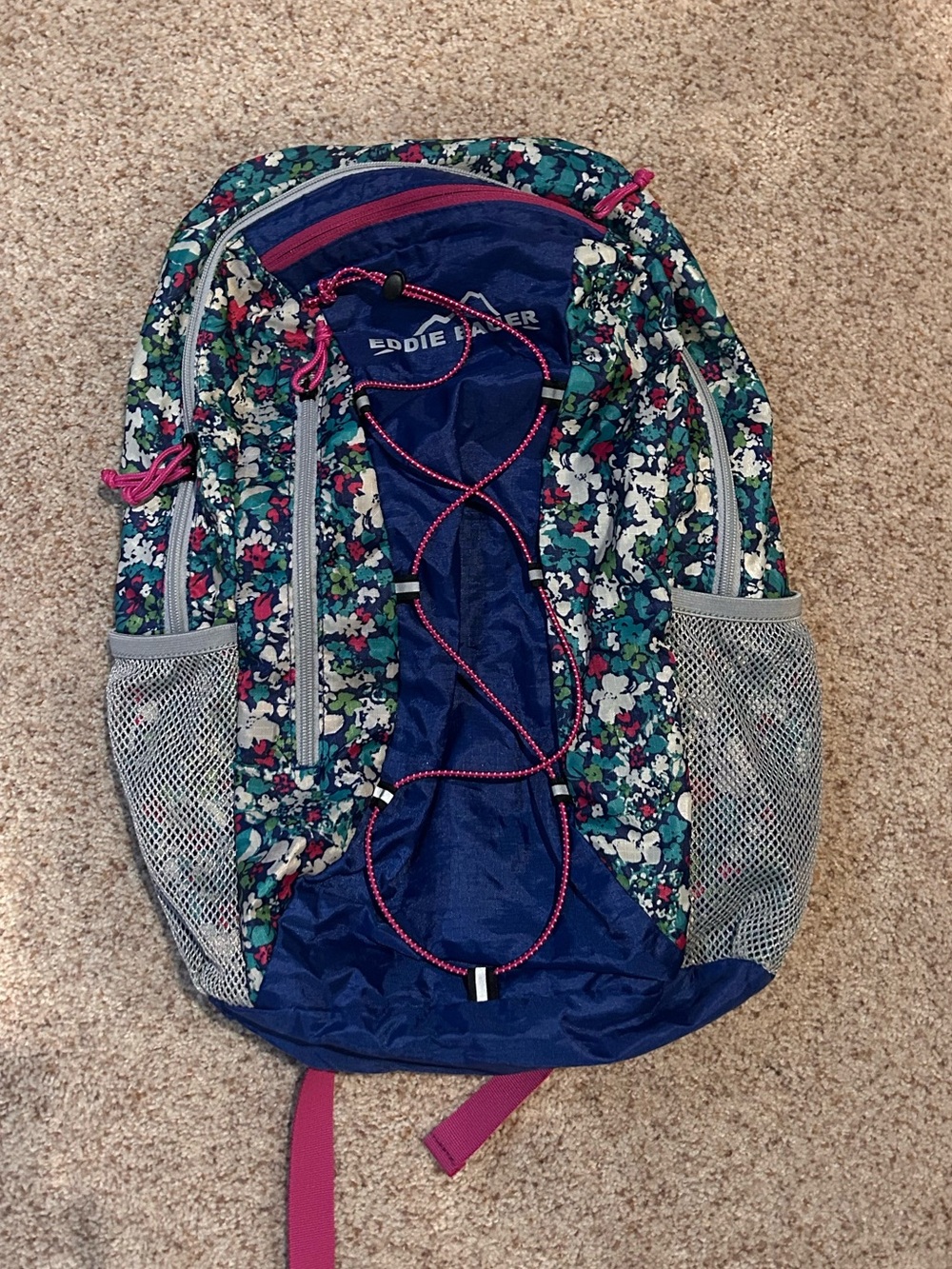 Eddie Bauer Cinch Adventure 25L backpack in a floral print.